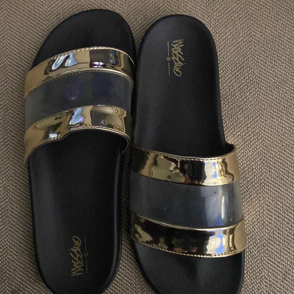 Black and gold pool slides